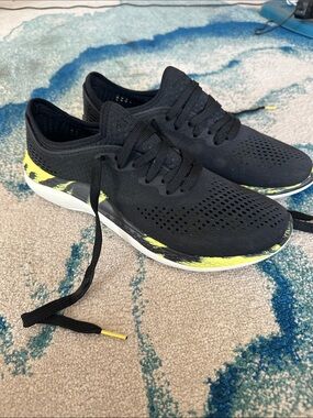CROCS Men's Black Boat Shoes with Yellow Accent